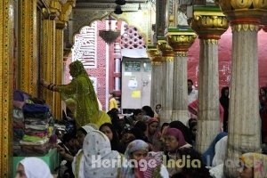 A Woman Raises Her Hands in Prayers at Hazrat Nizamuddin Dargah